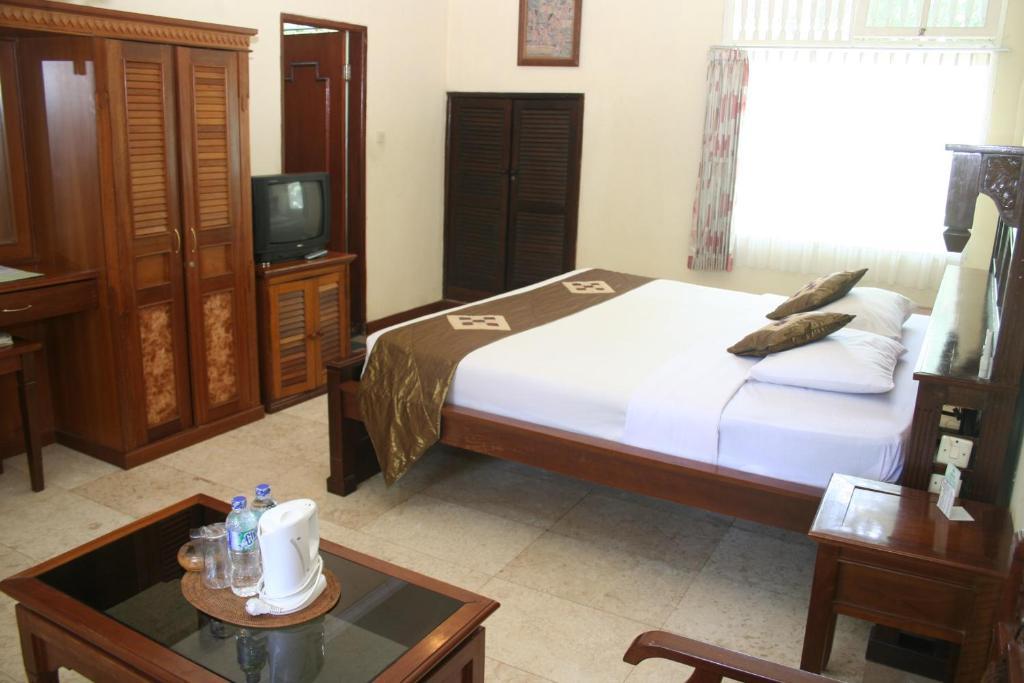 Melasti Kuta Bungalows & Spa Pokoj fotografie